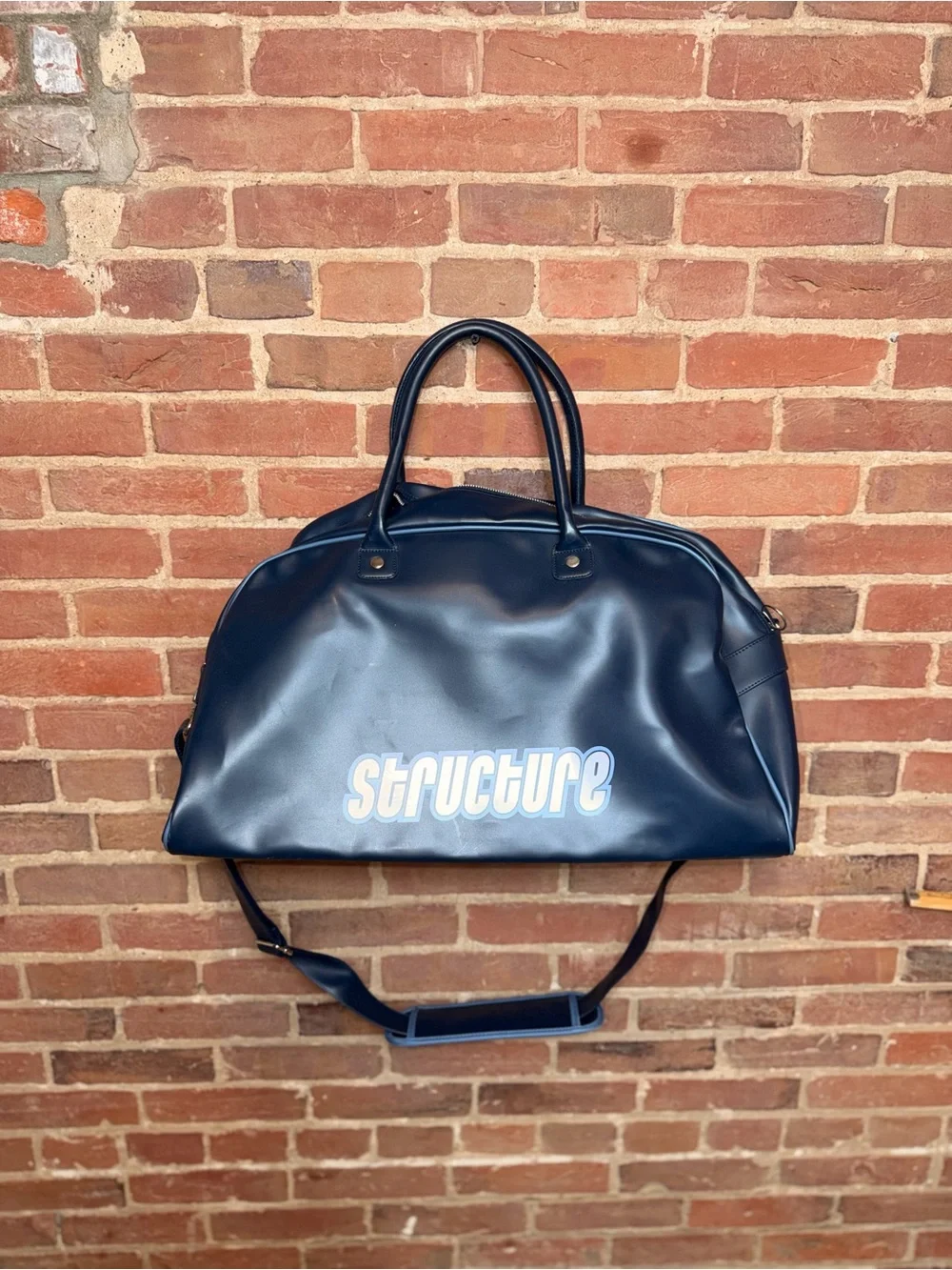 Structure Navy Duffel with White Logo and Adjustable Strap
